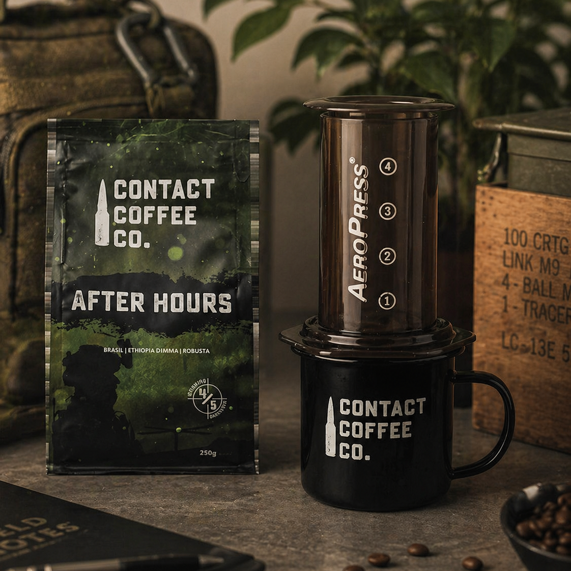 Contact Coffee Co. packaging and Aeropress coffee maker on a table with coffee beans.