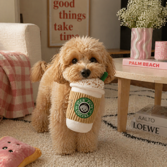 Dog holding coffee cup dog toy 