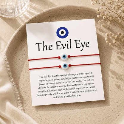 Evil eye bracelet with card on a textured surface