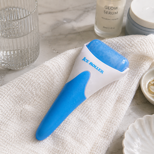 Blue ice roller on a textured surface with skincare products in the background