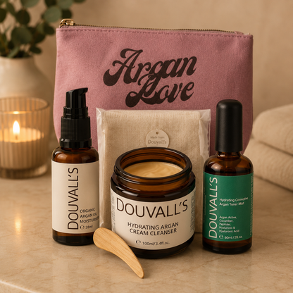 Douvall's skincare products including cream, bottles, and pouch on a neutral background