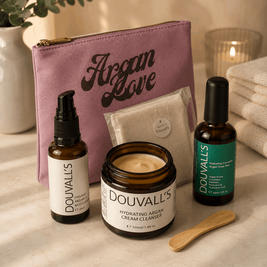 Douvall's skincare products including a jar, bottles, and a pouch on a neutral background.