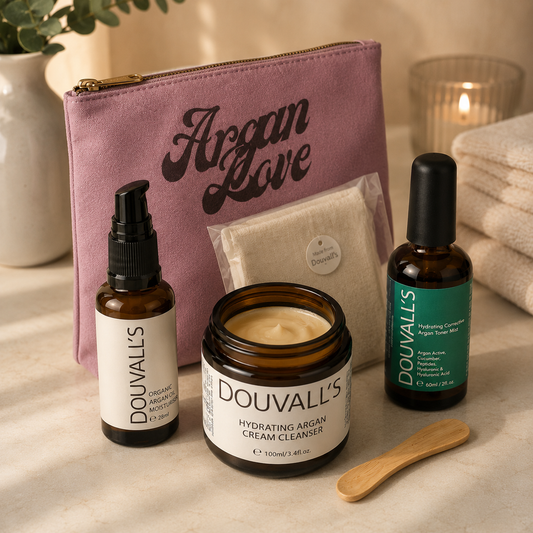 Douvall's skincare products including a jar, bottles, and a pouch on a neutral background.
