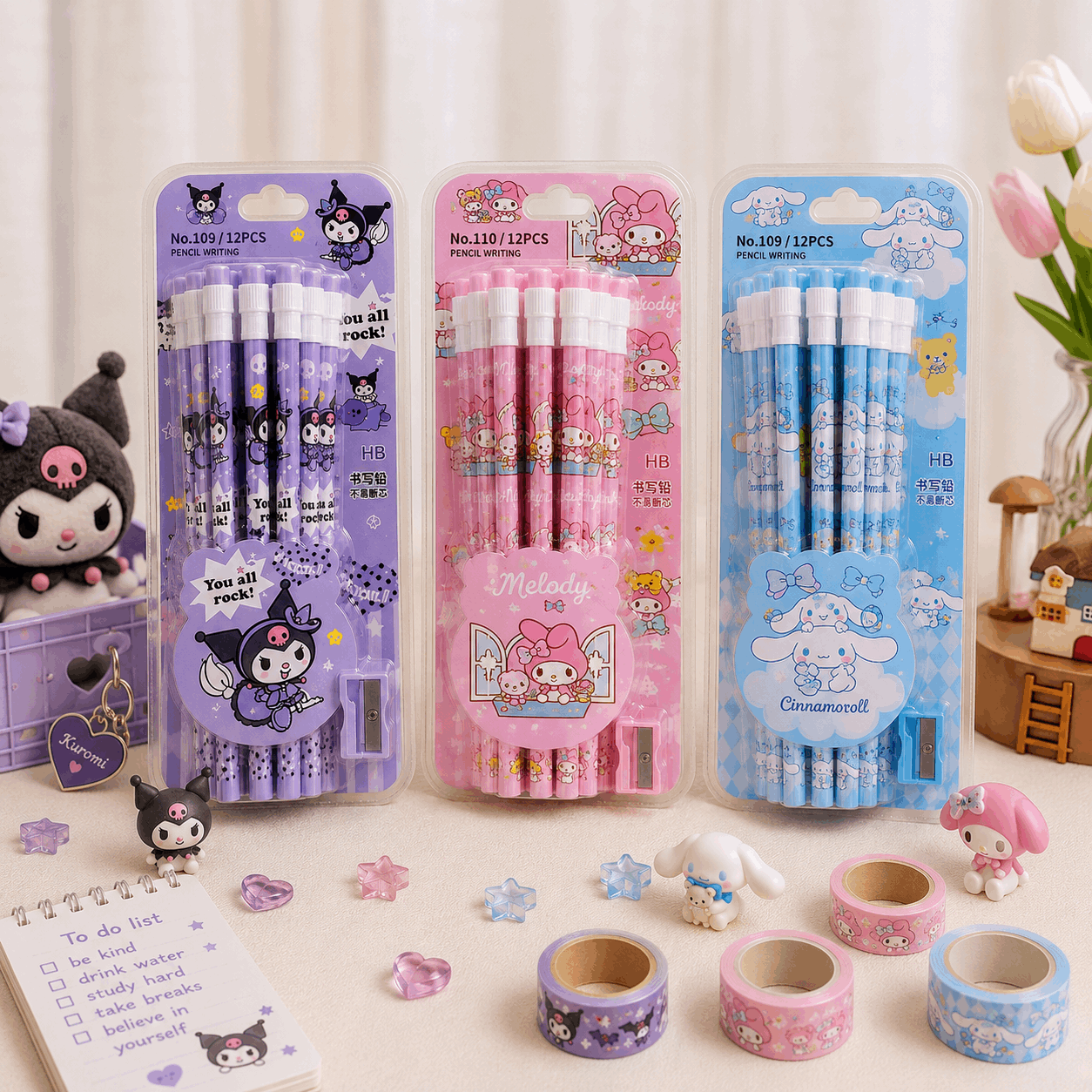 Three packages of pencils with cartoon characters on a table with stationery items.