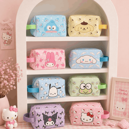 Set of colorful pouches with cartoon designs on a shelf.