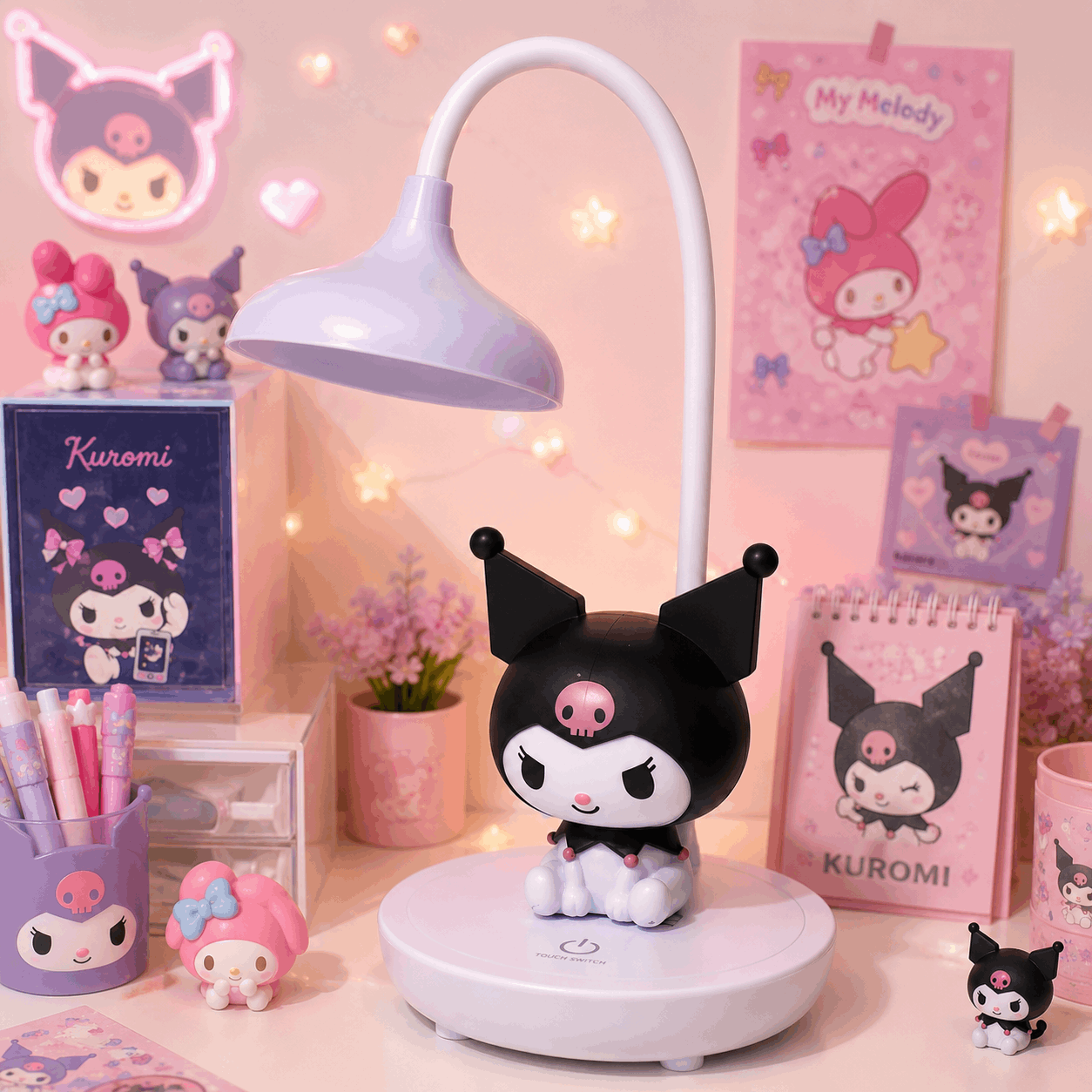 Anime character figurine on a desk with pink-themed decor