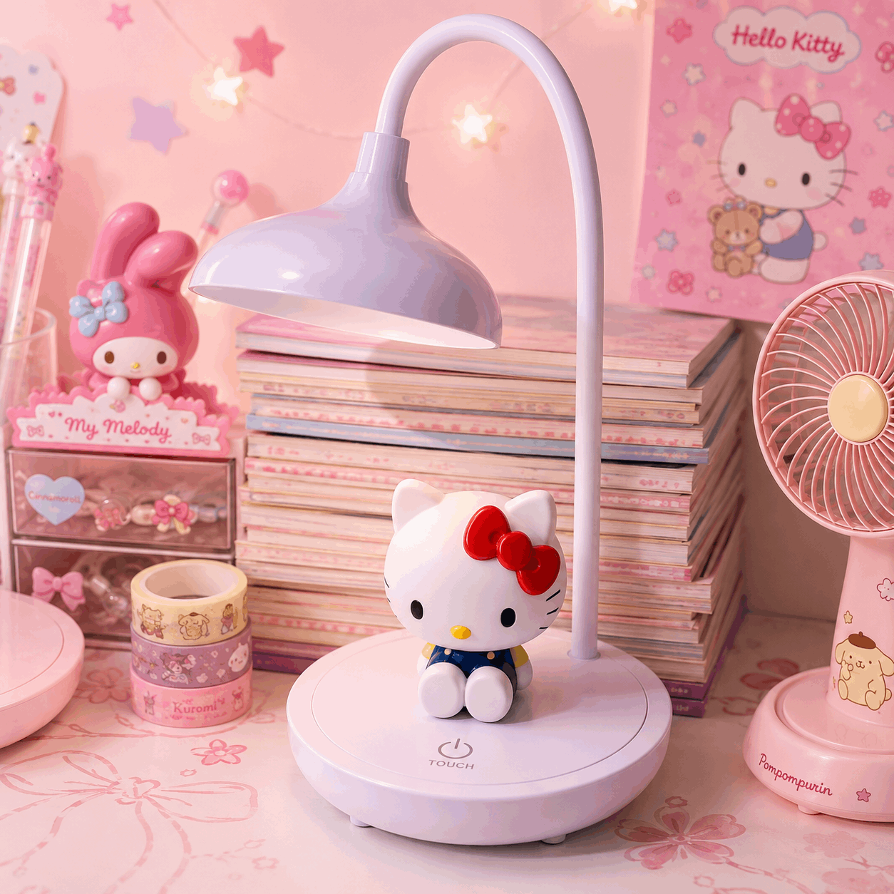 Hello Kitty desk lamp on a pink desk with stationery items
