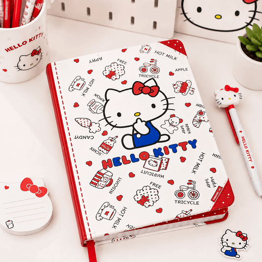 Hello Kitty notebook with stationery items on a white surface