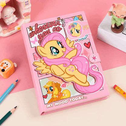 Pink notebook with cartoon pony design on a pink background