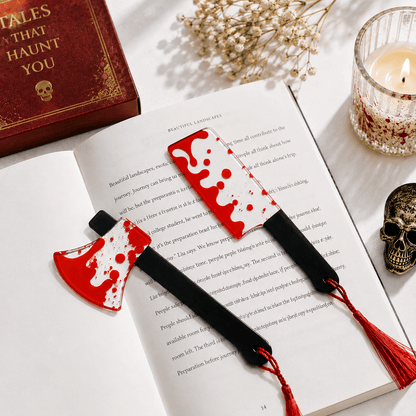 _axe-shaped bookmark with red and white design on an open book