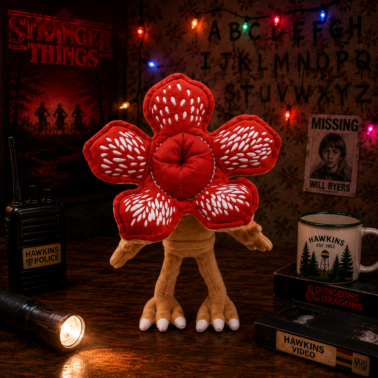 Stranger Things-themed plush toy with red flower-like design on a wooden surface.