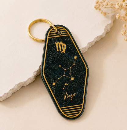 Keychain with Virgo zodiac design on a neutral background
