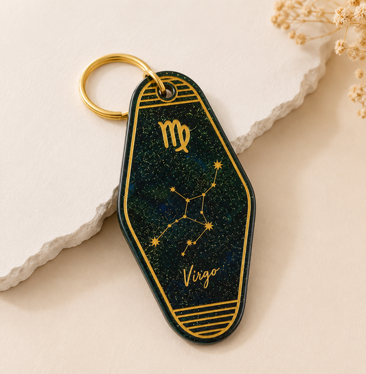 Keychain with Virgo zodiac design on a neutral background
