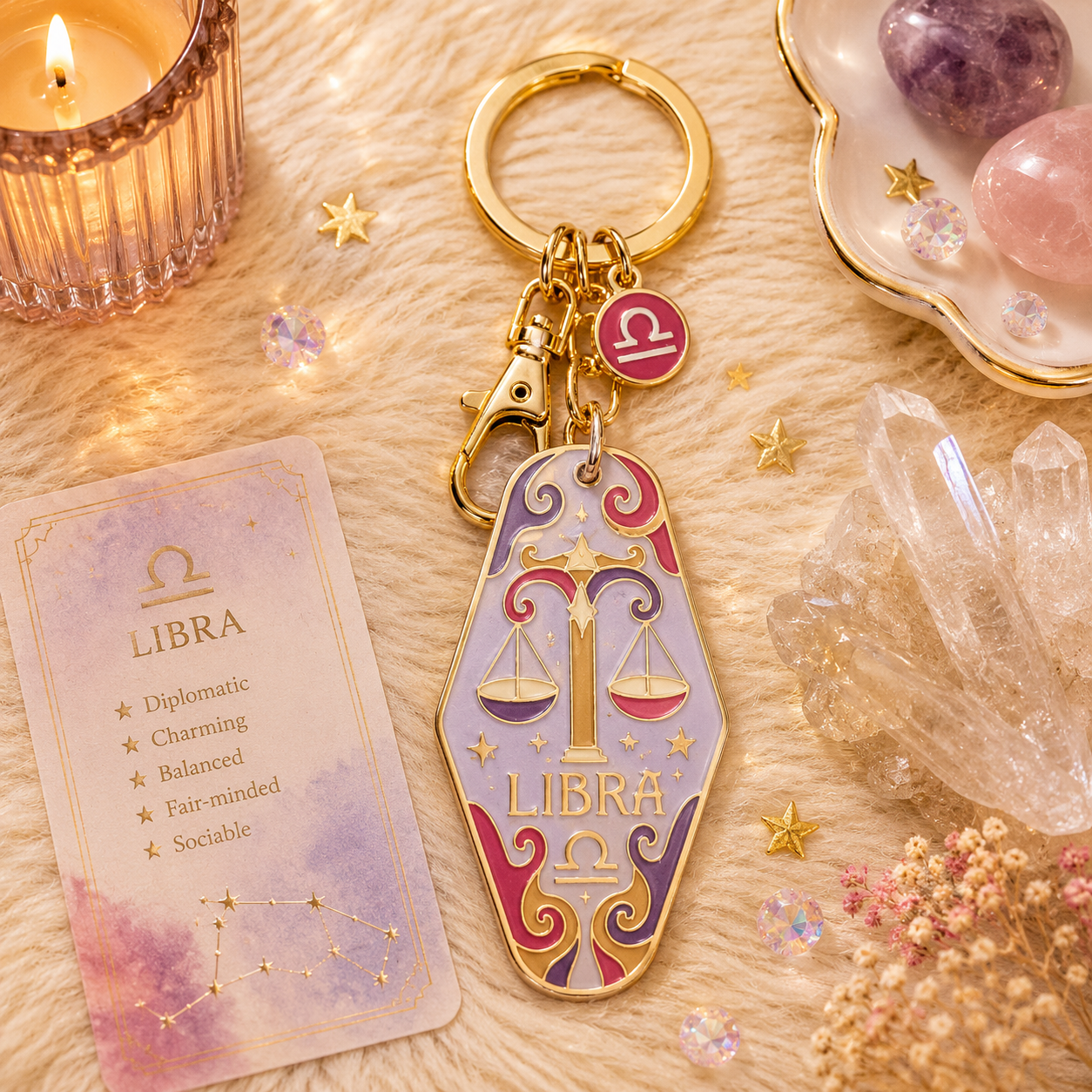 Libra zodiac keychain with card on a decorative surface with crystals and candles