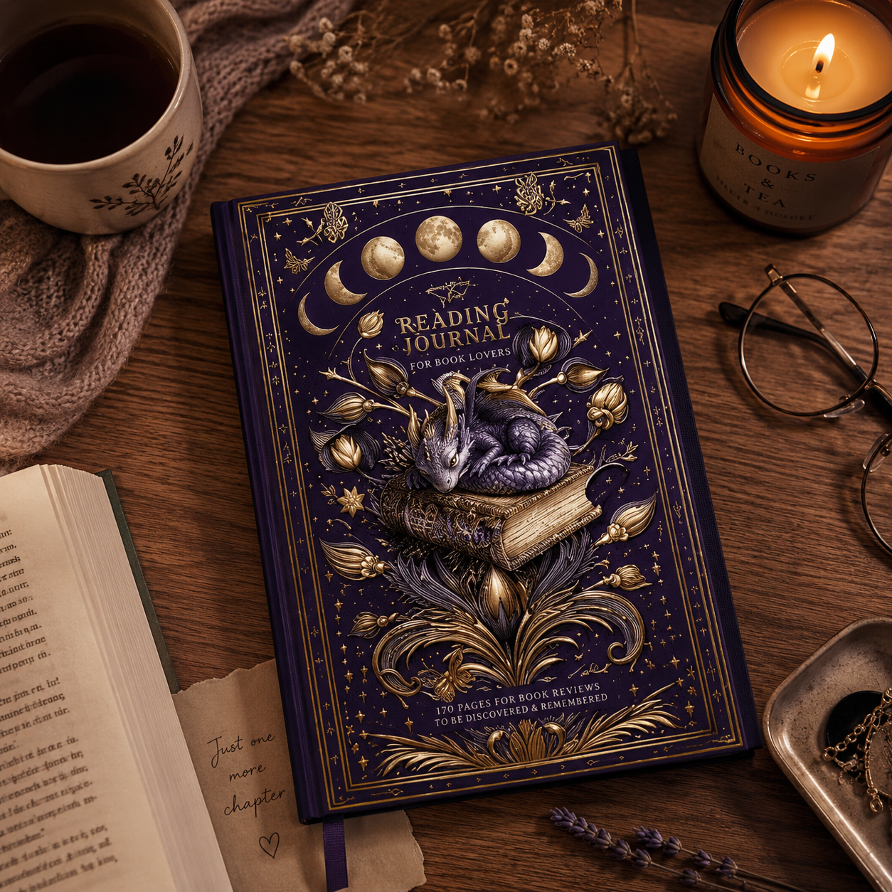 Decorative reading journal on a wooden table with a cup of coffee, candle, and glasses.