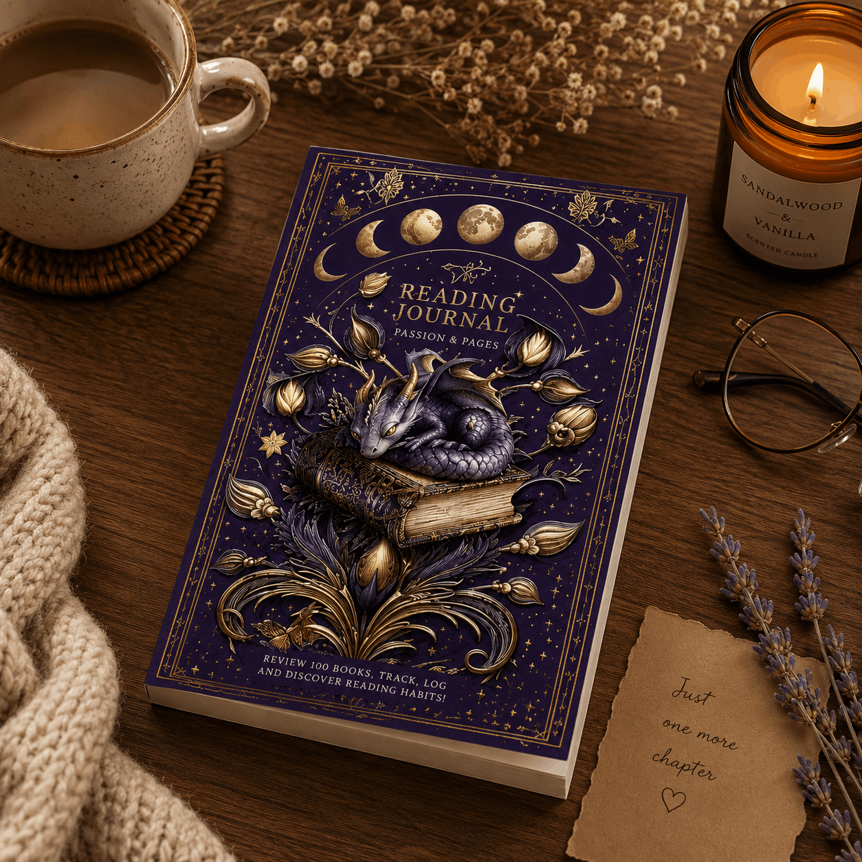 Reading journal with dragon illustration on a wooden table with a cup of coffee and candle.