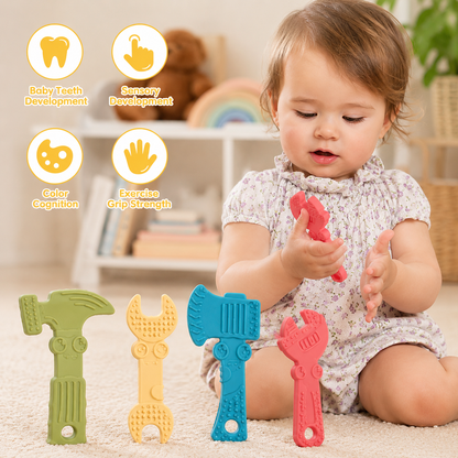 A toddler sits on a carpeted floor playing with four colorful baby teething toys shaped like a hammer, wrench, axe, and wrench. The scene includes text callouts highlighting toy features such as baby teeth development, sensory development, color cognition, and gross motor strength.