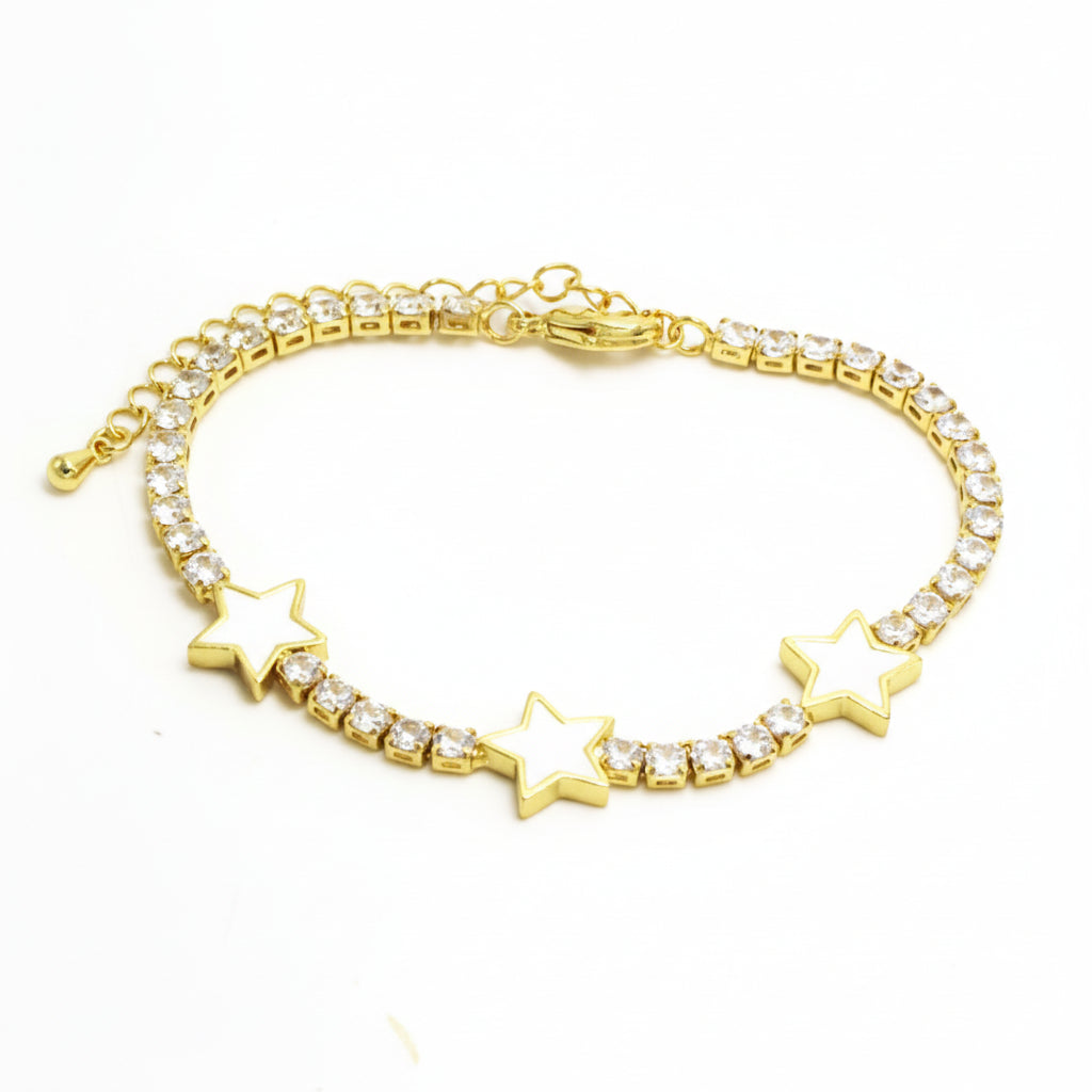 Gold bracelet with star-shaped links on a white background