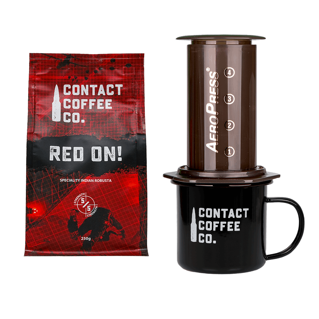 Contact Coffee Co. package, AeroPress coffee maker, and black mug on a white background