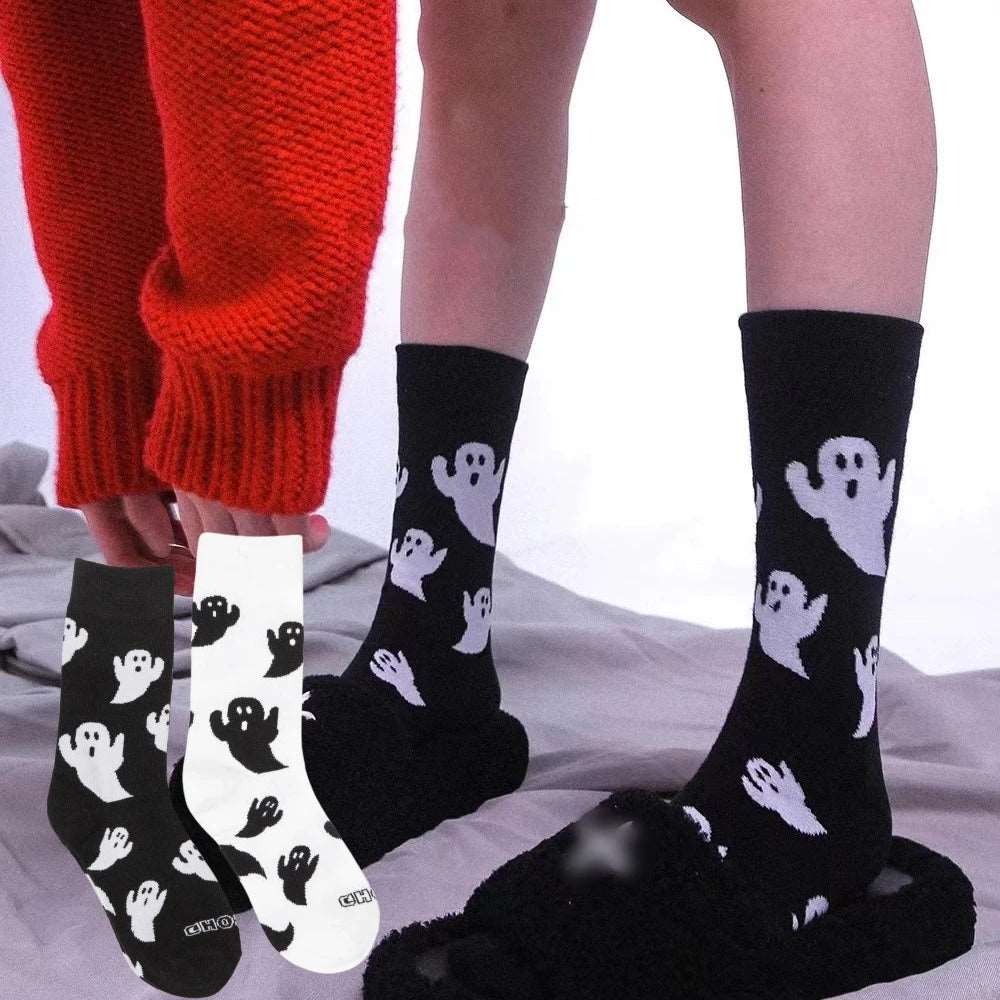 model wearing black halloween socks