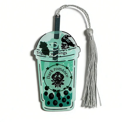 Decorative tag with tassel shaped like a drink container with text and graphics on a white background