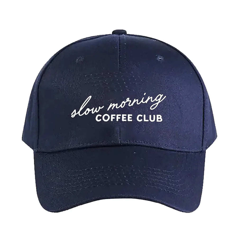 Navy blue cap with 'slow morning COFFEE CLUB' text on a white background