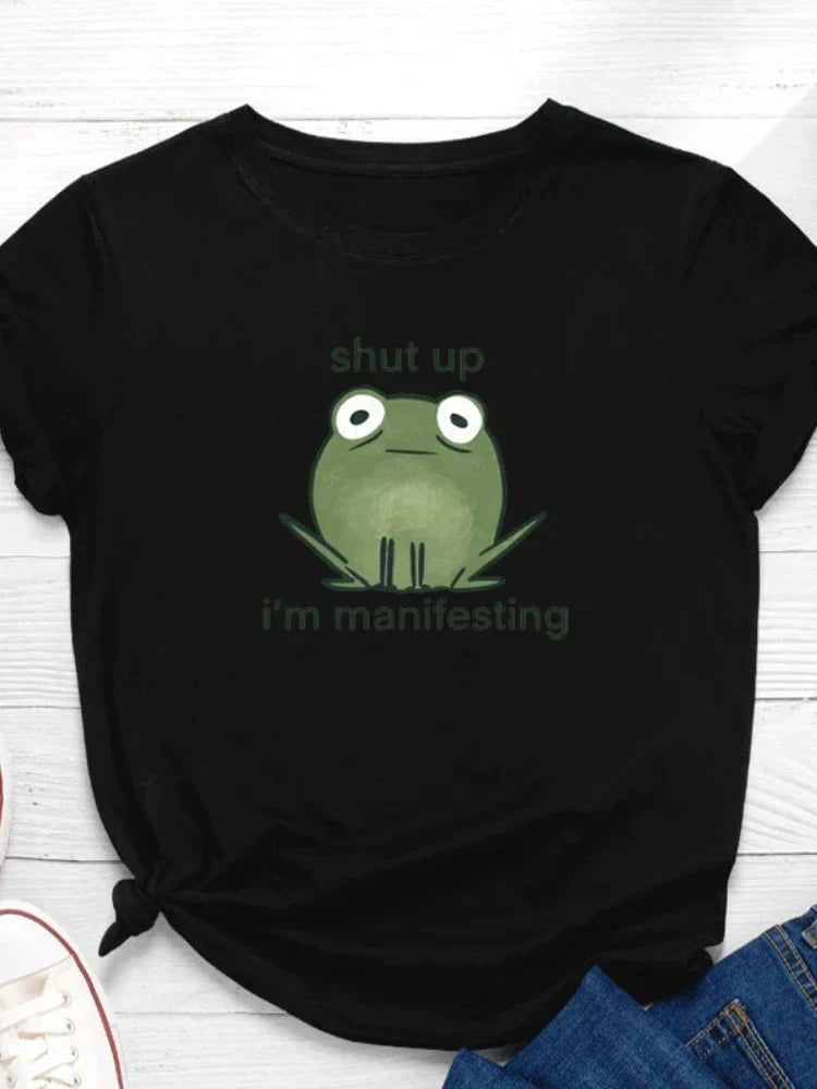 I'm Manifesting Frog Print Graphic T Shirt - T Shirts from Dear Cece - Just £14.99! Shop now at Dear Cece