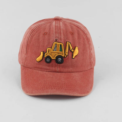 Red cap with a yellow bulldozer emblem on a light gray background