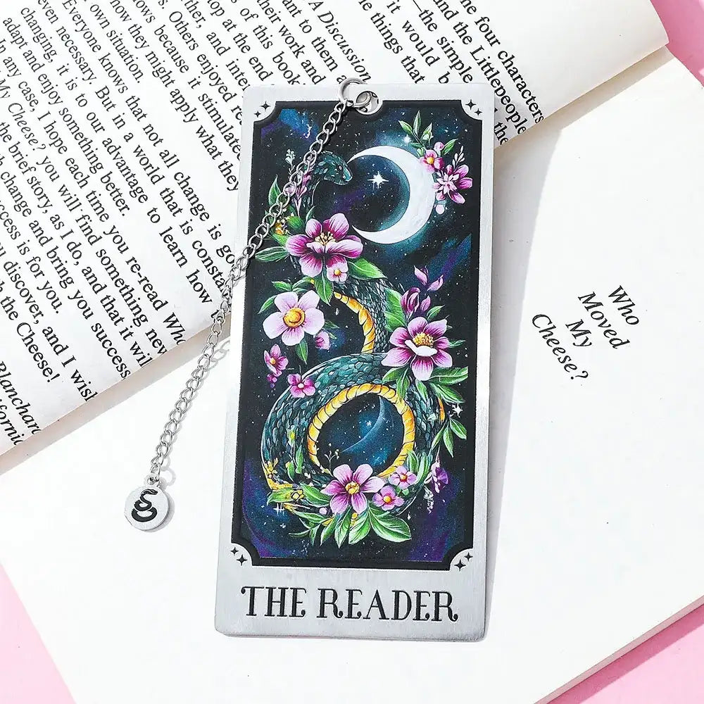 Decorative tarot card with dragon and flowers on a book page