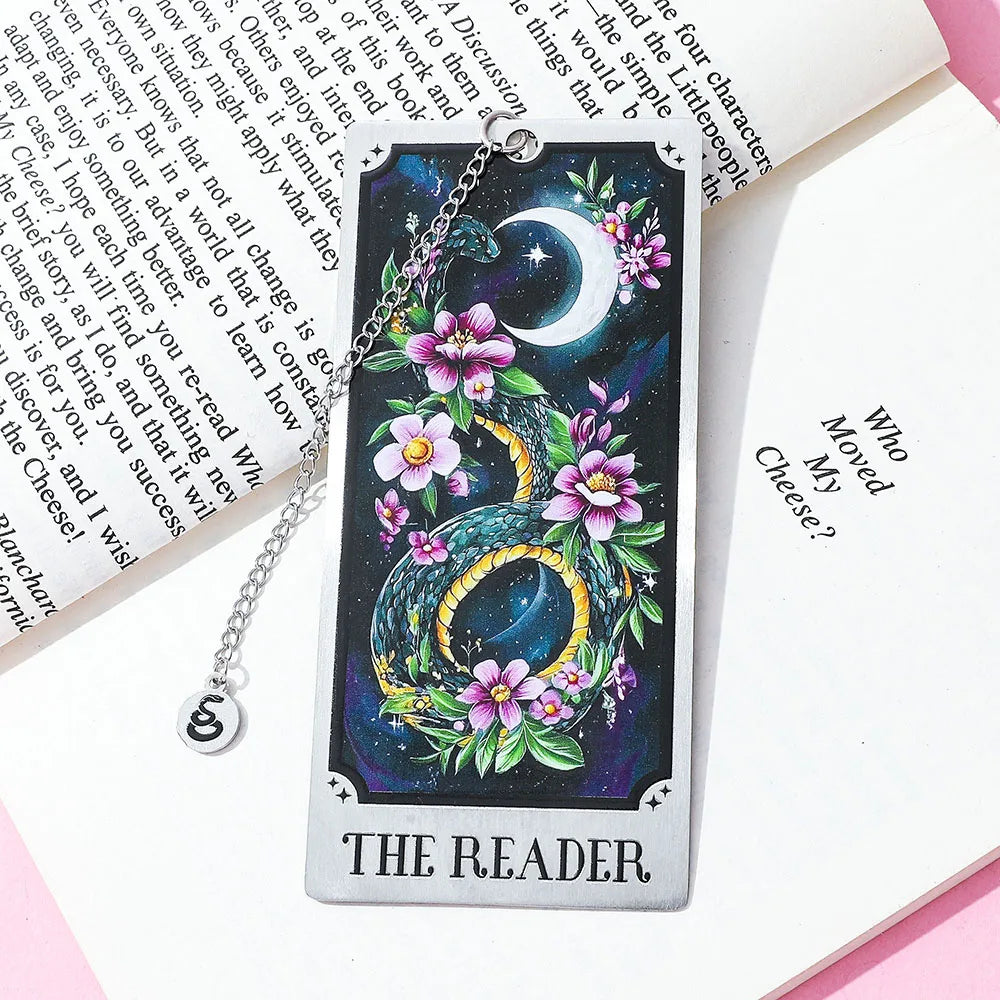 Decorative tarot card with dragon and flowers on a book page