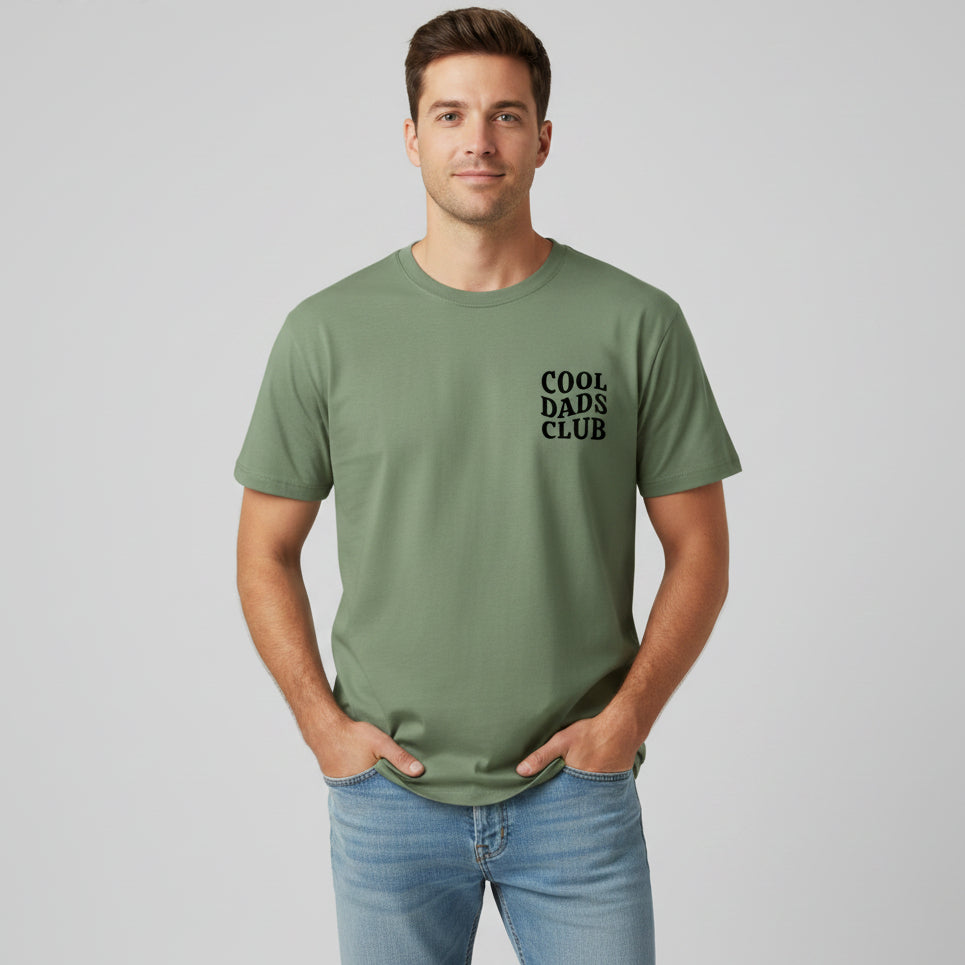 Man wearing green cool dads club tshirt