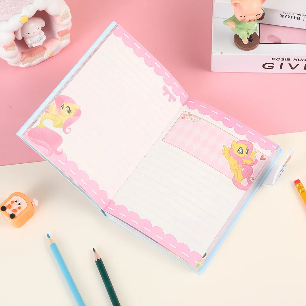 Notebook with pink decorative elements on a pink background