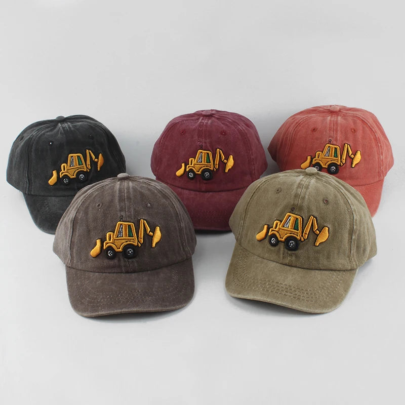 Five baseball caps with construction vehicle embroidery on a white background