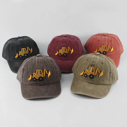 Five baseball caps with construction vehicle embroidery on a white background