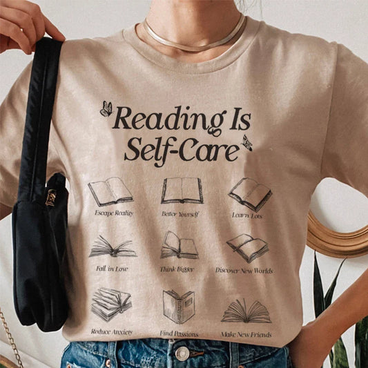 Reading Is Self-Care Bookworm Graphic T-Shirt - T Shirts from Dear Cece - Just £15.99! Shop now at Dear Cece