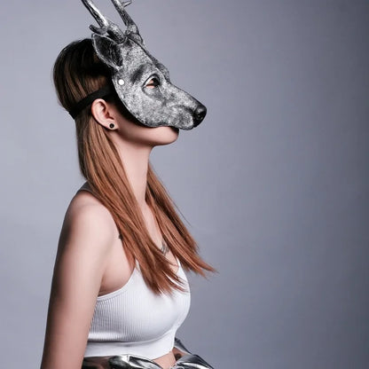 model wearing silver mask