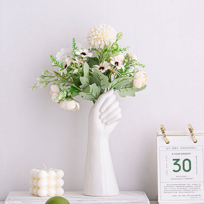 White Hand Vase with flowers on display