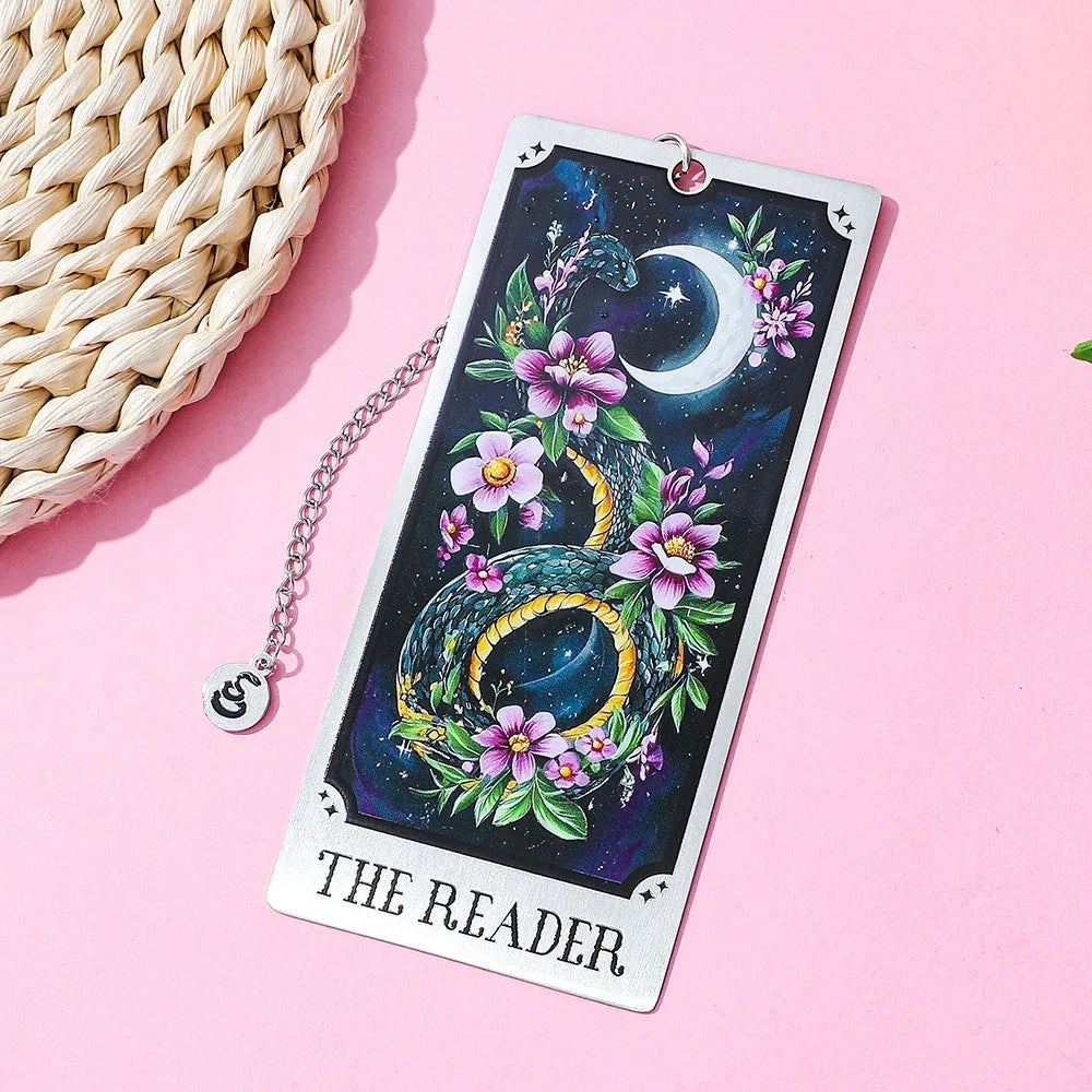 Tarot card with dragon and flowers design on a pink background