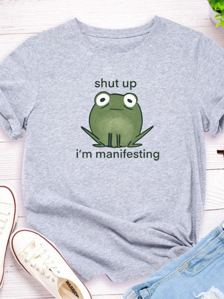 I'm Manifesting Frog Print Graphic T Shirt - T Shirts from Dear Cece - Just £14.99! Shop now at Dear Cece