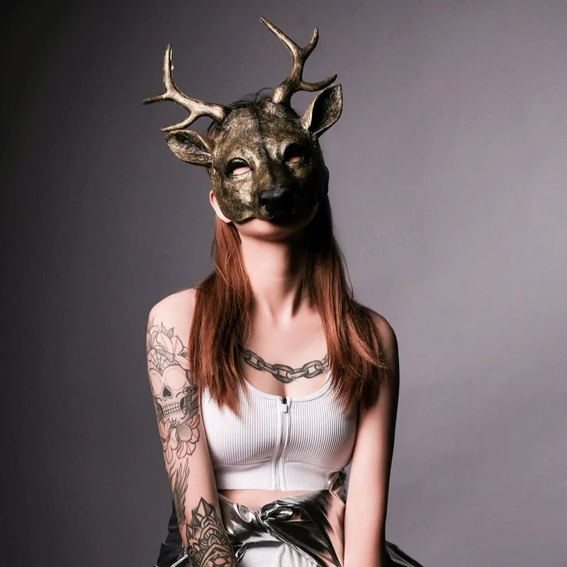 model wearing gold deer mask