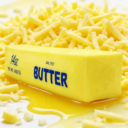 Butter Stick Milk Strip Squishy Toy on a butter background