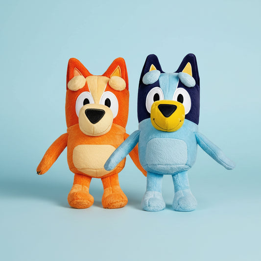Two colorful plush toys, one orange and one blue, standing on a wooden surface with a blurred background.