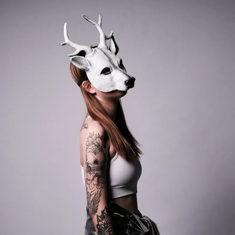 Model wearing white deer mask