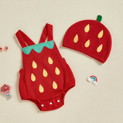 Strawberry-themed baby romper and hat set on a beige background