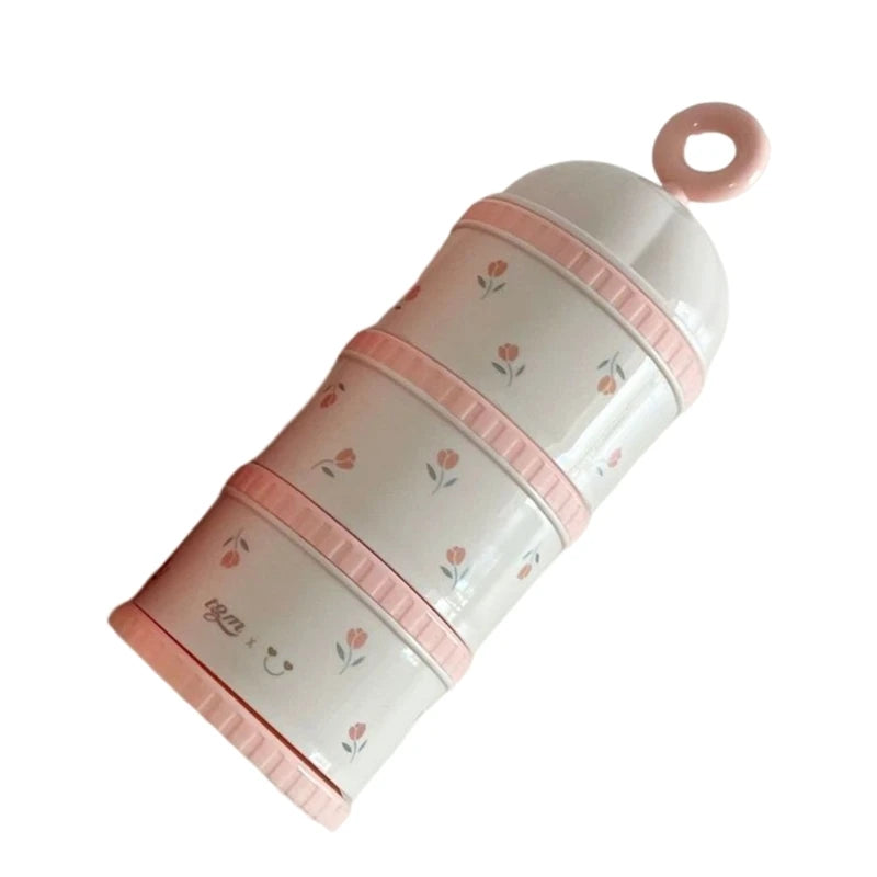 Pink and white Baby Formula Dispenser Storage Container with floral design on a white background