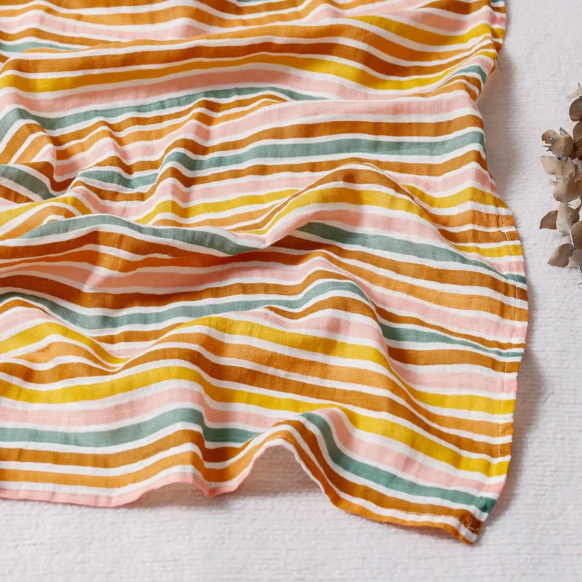 Striped fabric with multicolor pattern on a light background