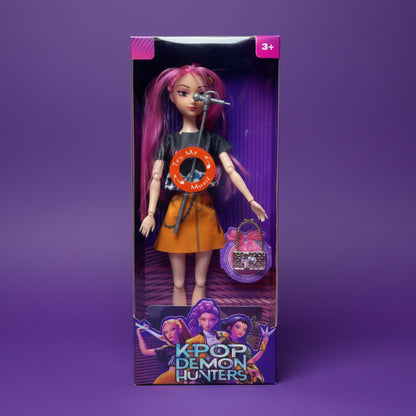 K-Pop doll with microphone and accessories in packaging, featuring 'K-Pop Demon Hunters' branding.