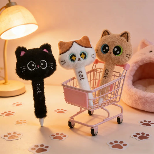 Three cat-shaped plush toys in a small pink shopping cart on a surface with paw print patterns.