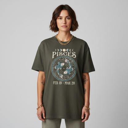 Person wearing a t-shirt with Pisces zodiac design on a plain background