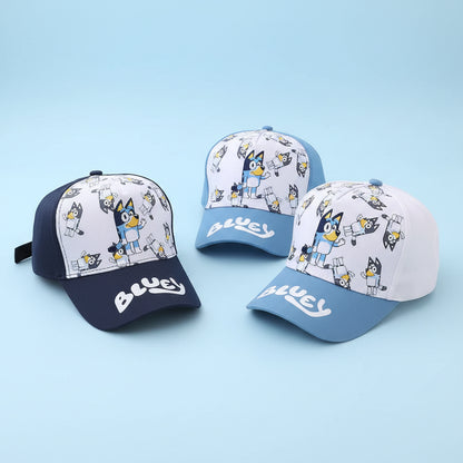 Three children's baseball caps with cartoon character design on a white surface.